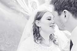 Black and white portrait of bride with elegant makeup