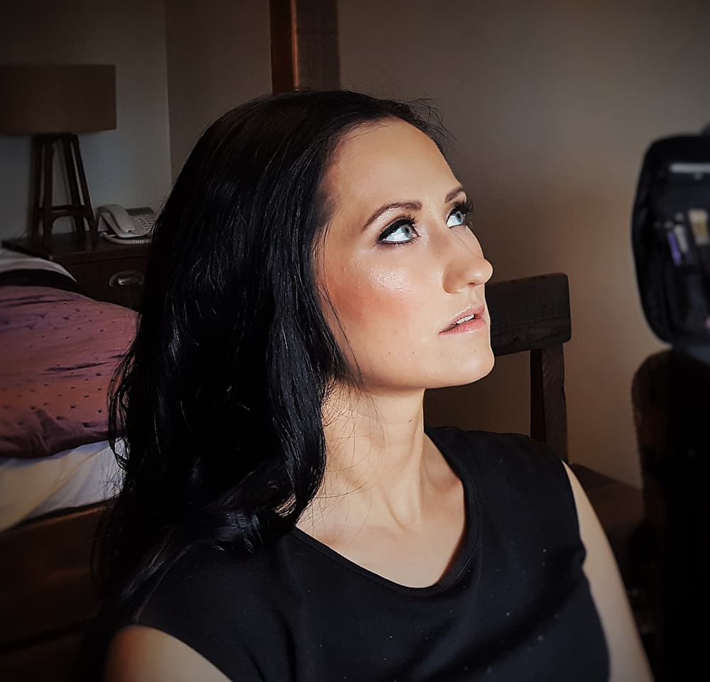 Bride with elegant updo and classic bridal makeup