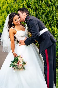Bride wearing classic lace gown with soft natural makeup