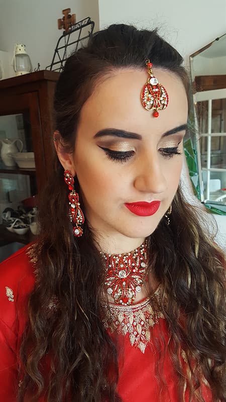 Bold photoshoot makeup with warm tones