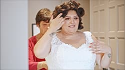 Elegant bride in gown with flawless bridal makeup