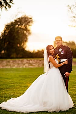 Golden hour wedding photo highlighting flawless bridal makeup