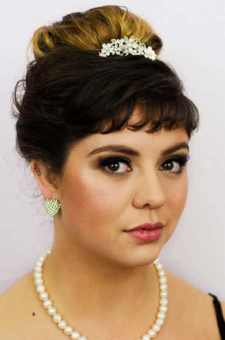 Soft glam prom makeup look with shimmer highlight