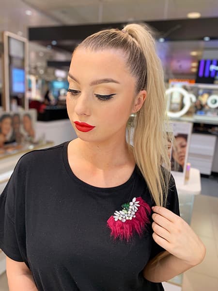 Glamorous red lip and sharp eyeliner look