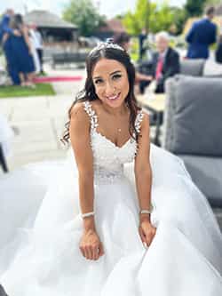 Bride on wedding morning with soft natural makeup